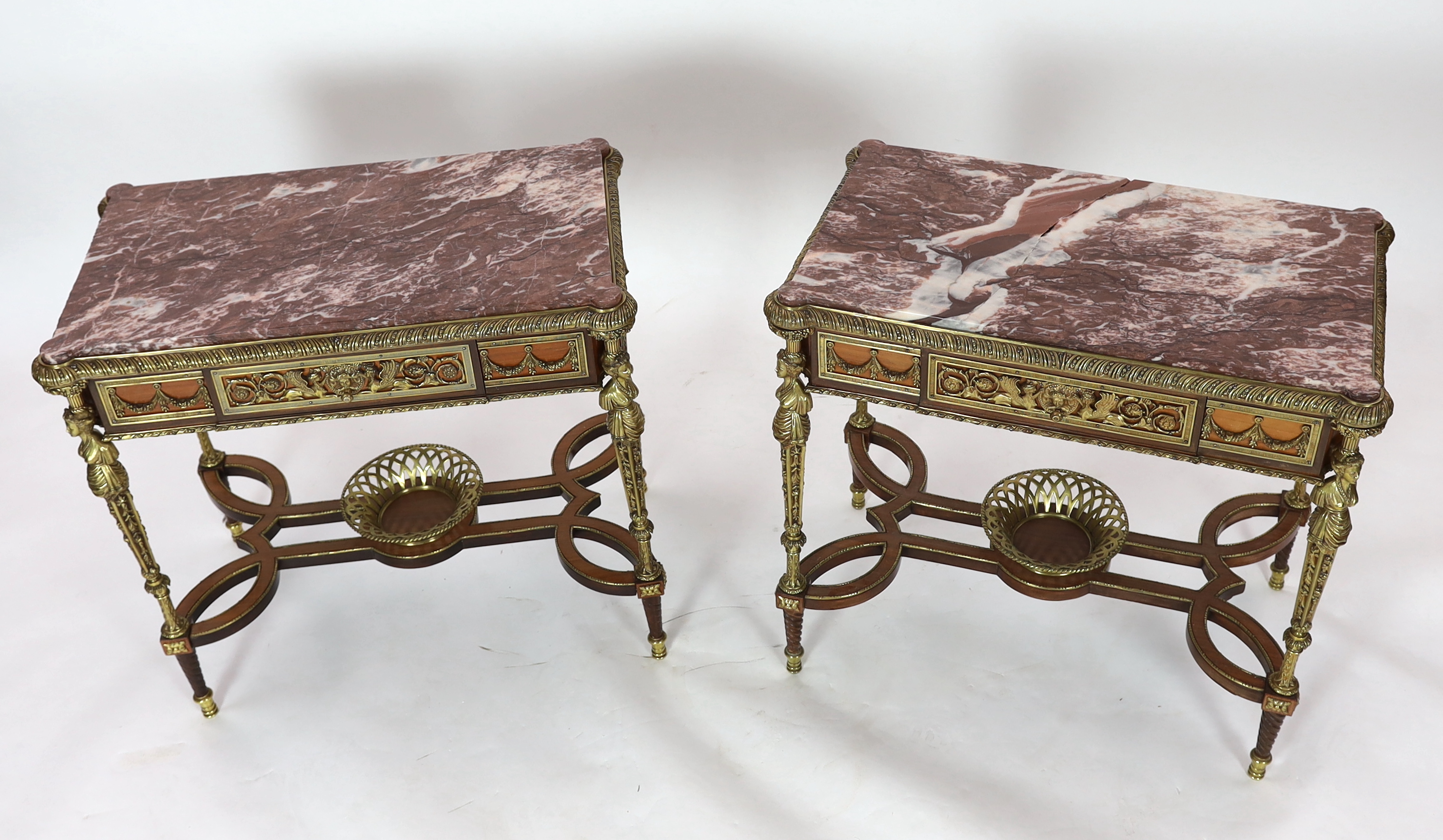 A pair of Louis XVI style ormolu mounted centre tables, 85cm wide, 51cm deep, 79cm high